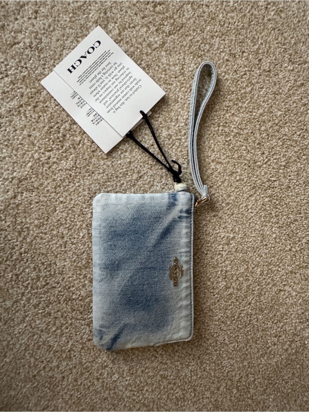 Coach corner zip loved denim wristlet
